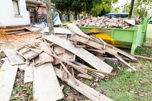 Professional garage clearance team at work in Hackney garage